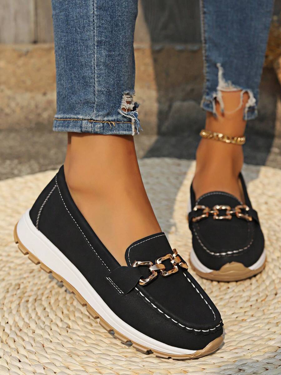 Women's comfortable horsebit loafers with a sleek gold trim, essential versatile footwear.