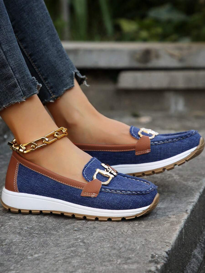 Sophisticated women's gold-trim horsebit loafers, perfect blend of comfort and elegant style.