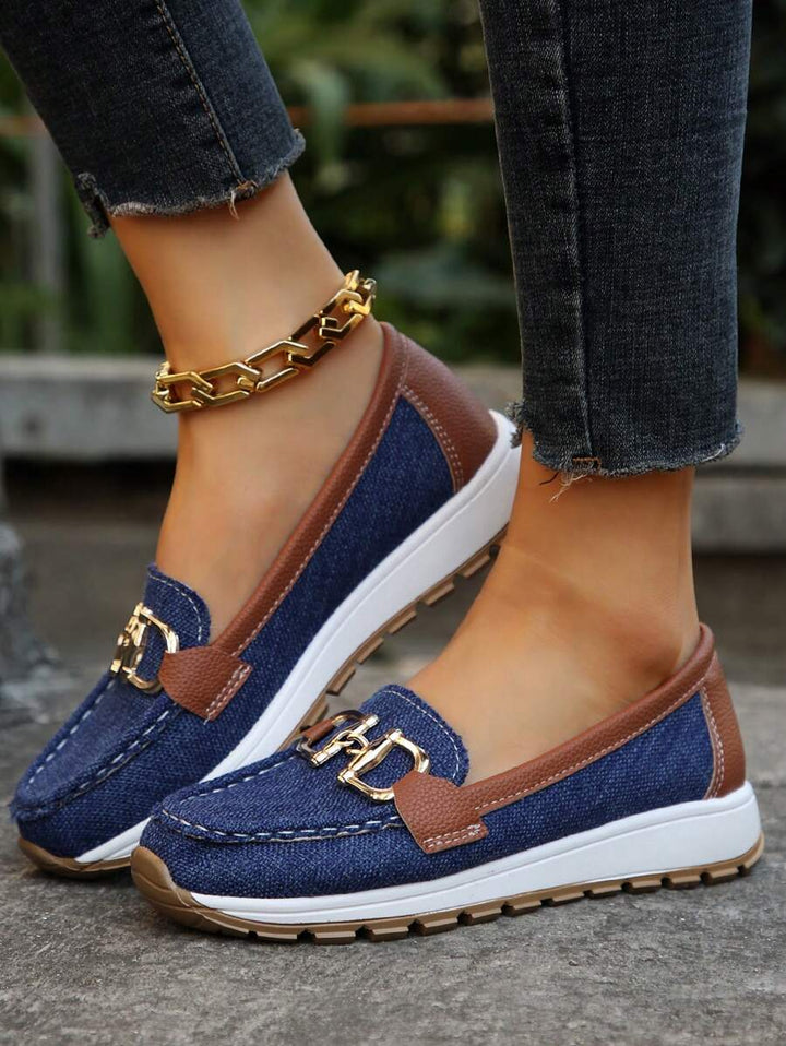 Comfortable women's horsebit loafers with stylish gold trim; versatile slip-on shoes for everyday wear.