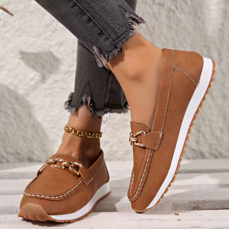 Casual women's slip-on horsebit loafers with a chic gold trim, perfect for versatile everyday fashion.