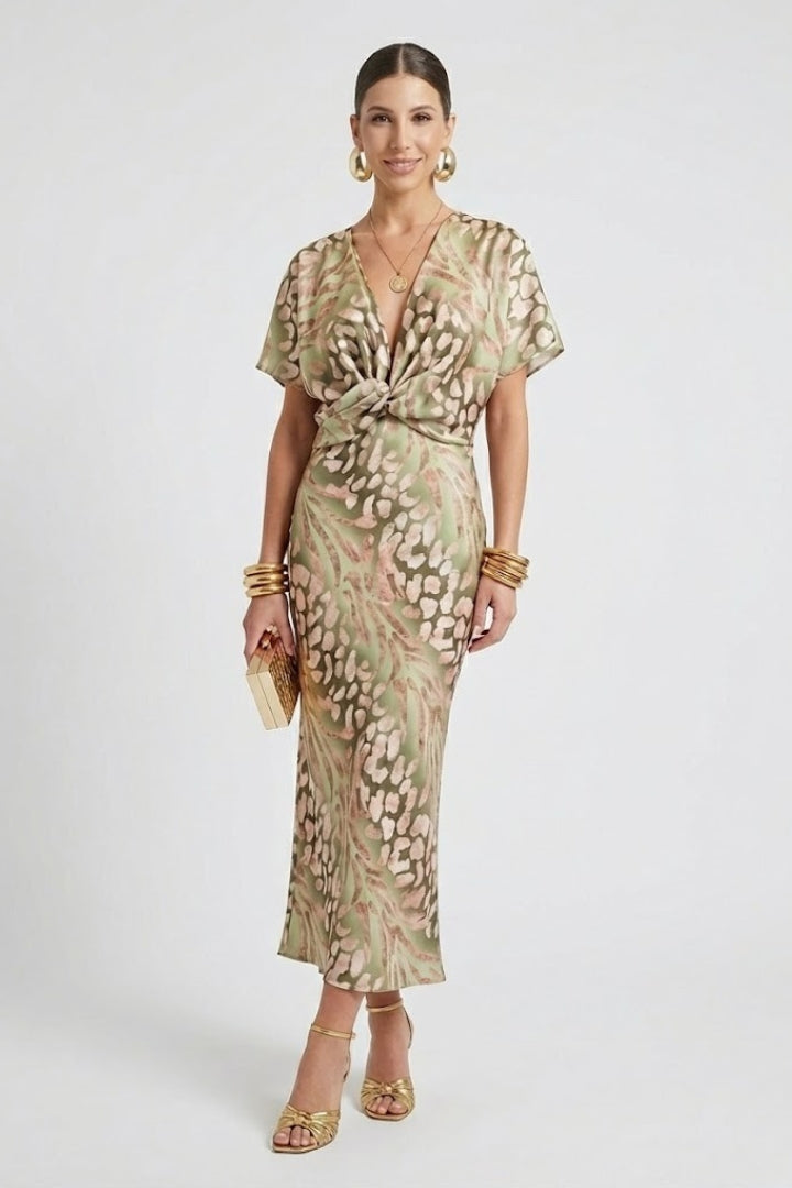Chic floral print midi dress for women featuring a V-neck, short sleeves, and stylish pleated skirt, perfect for daywear.
