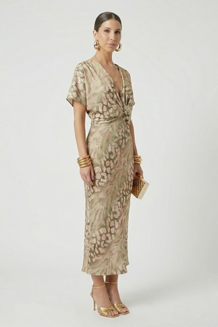 Elegant green floral midi dress for women with a V-neck, short sleeves, and pleated hem, ideal for summer occasions.