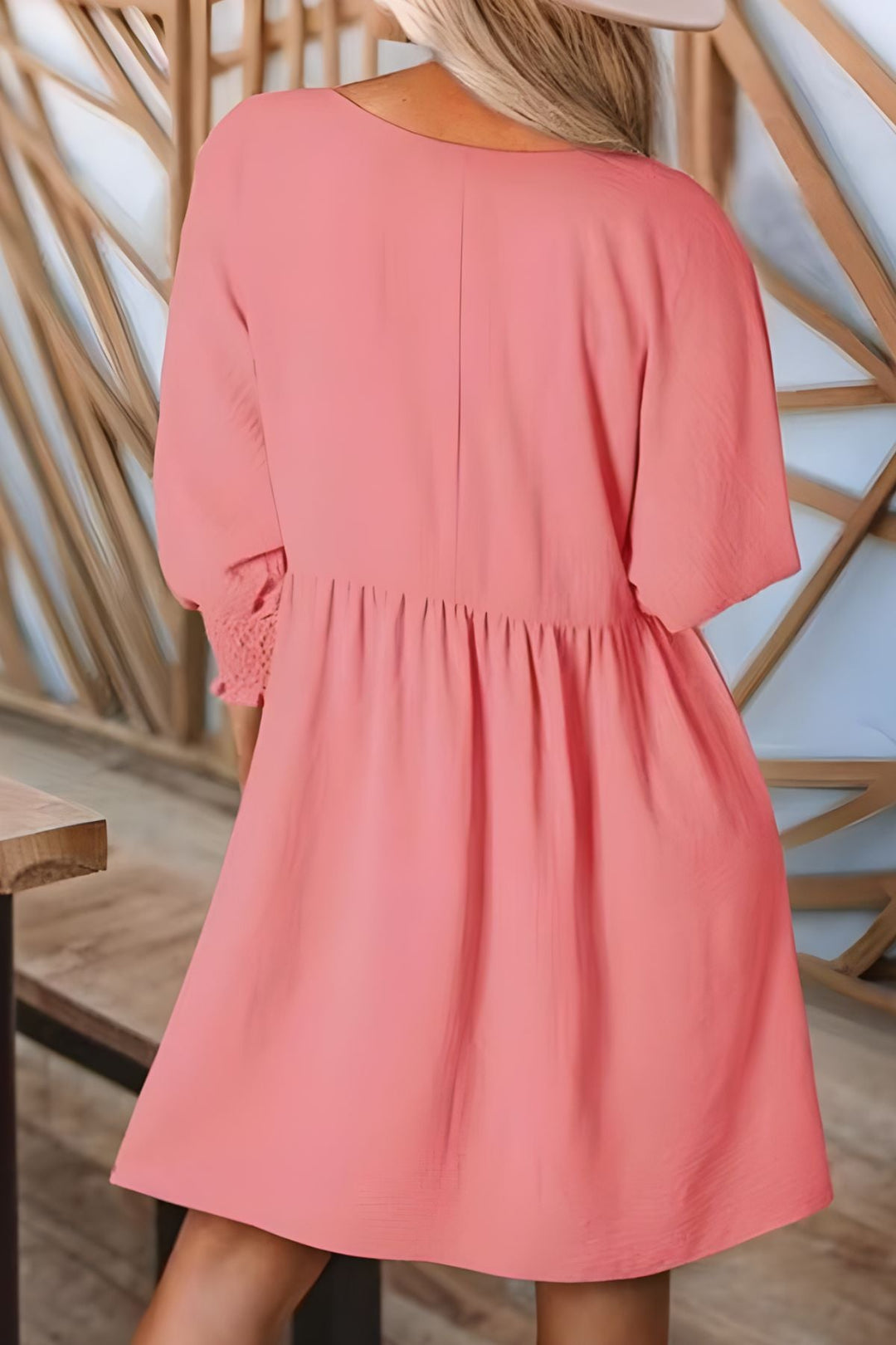 Versatile women's babydoll mini dress, half sleeves, smocked cuffs, perfect for casual looks.