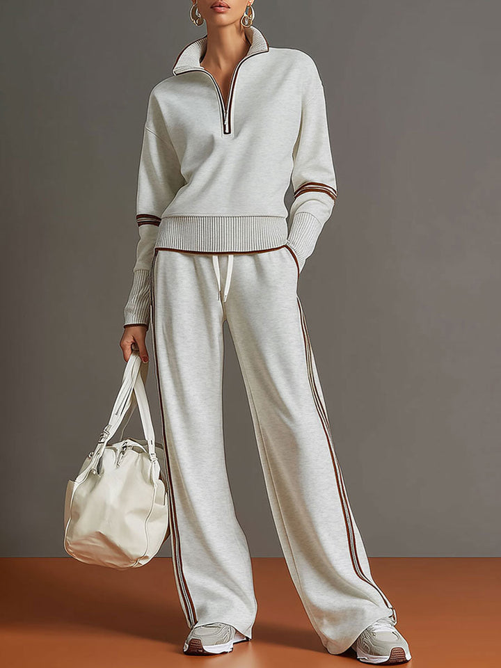 Women's half-zip sweatshirt & wide-leg trouser co-ord set in a comfortable, stylish loungewear fit.