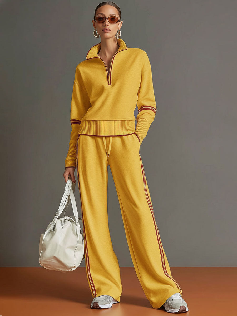 Women's casual half-zip sweatshirt & wide-leg trouser set. A comfortable and versatile two-piece outfit.