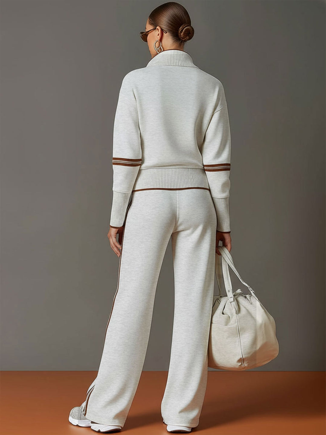 Stylish women's half-zip pullover & wide-leg pant co-ord, perfect for casual or athleisure looks.