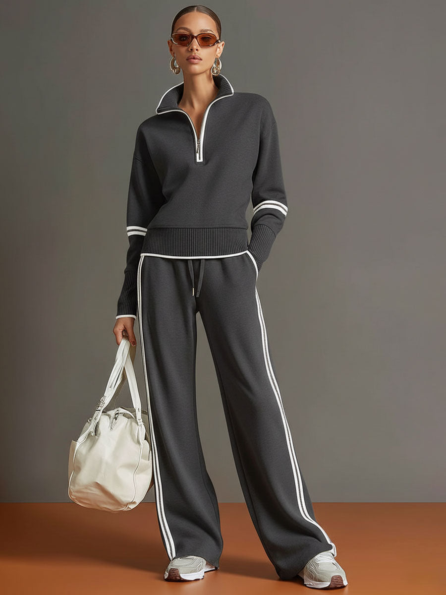 Modern women's two-piece set: half-zip sweatshirt and comfortable wide-leg trousers. Great for lounging.