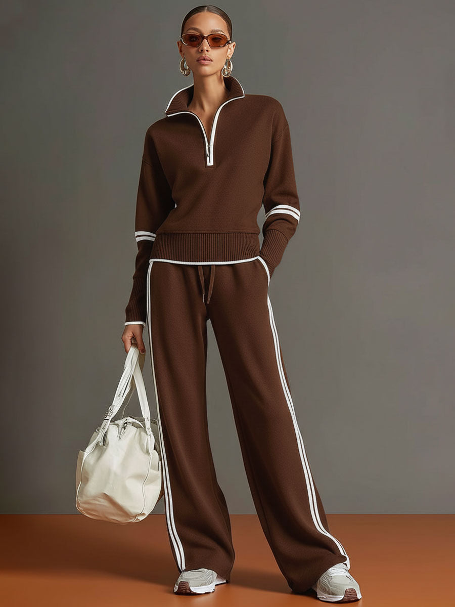 Fashionable women's wide-leg trouser & half-zip sweatshirt set. Perfect for relaxed, stylish outfits.