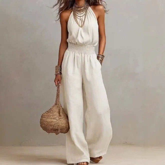 Women's halter neck wide leg jumpsuit in a chic solid color, perfect for elegant casual wear or summer resort outfits.