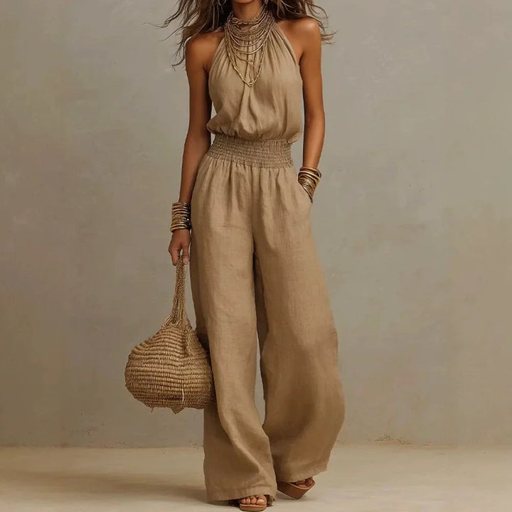 Elegant women's halter neck wide leg jumpsuit, ideal for summer fashion, casual wear, or a stylish dressy look.