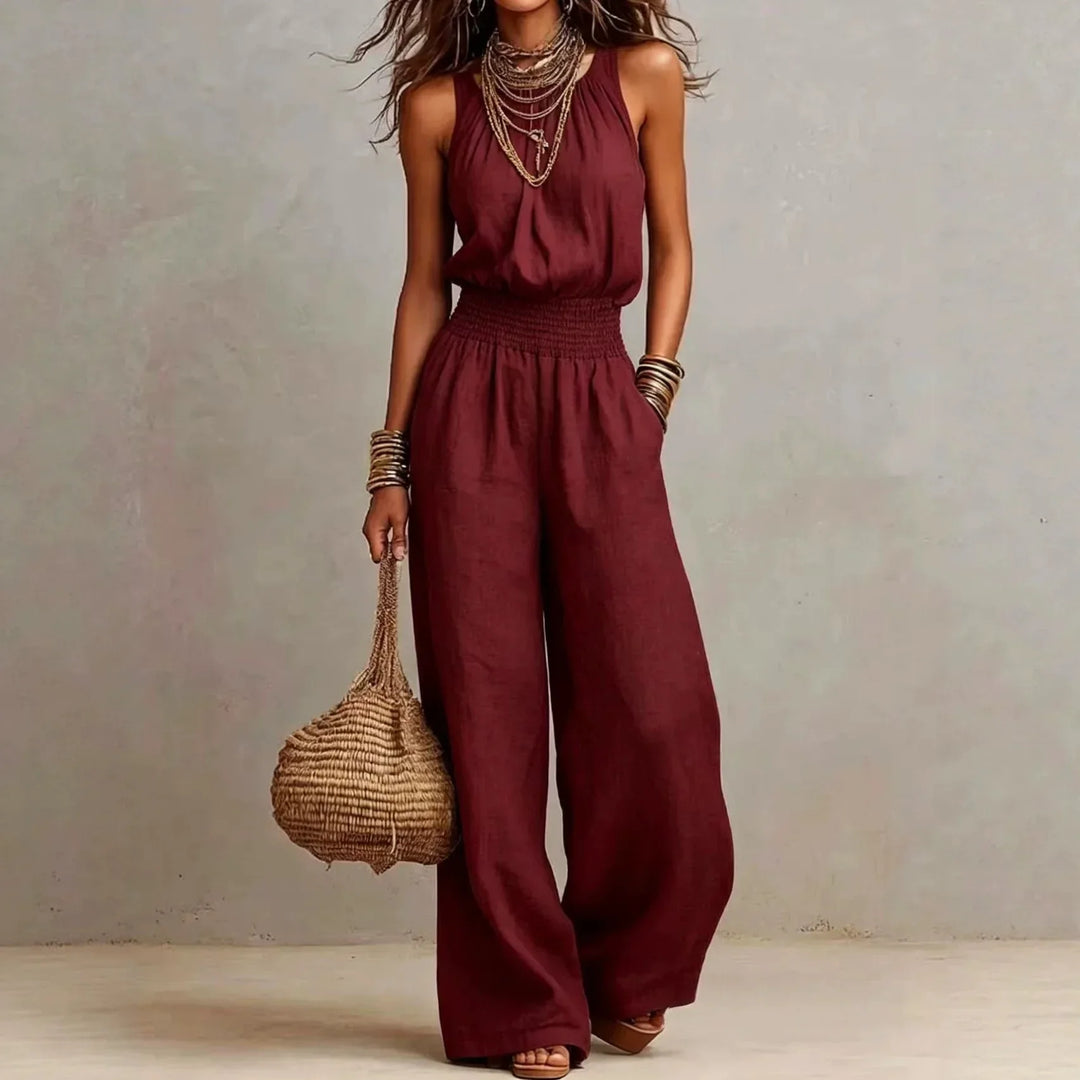 Comfortable one-piece women's halter neck wide leg jumpsuit, a perfect vacation outfit with a flowing silhouette.