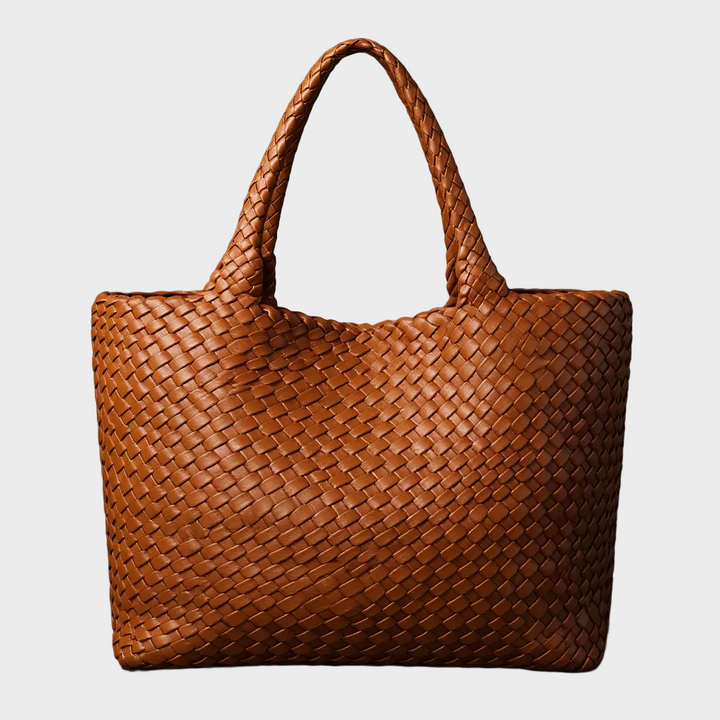 Women's handwoven leather large tote bag, perfect for everyday use. Stylish shoulder handbag with ample space.