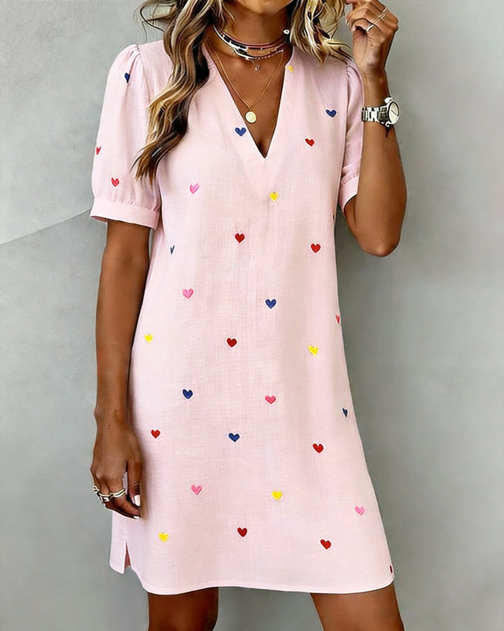 Comfortable women's V-neck heart print casual dress with puff sleeves & relaxed fit. Great for summer days.