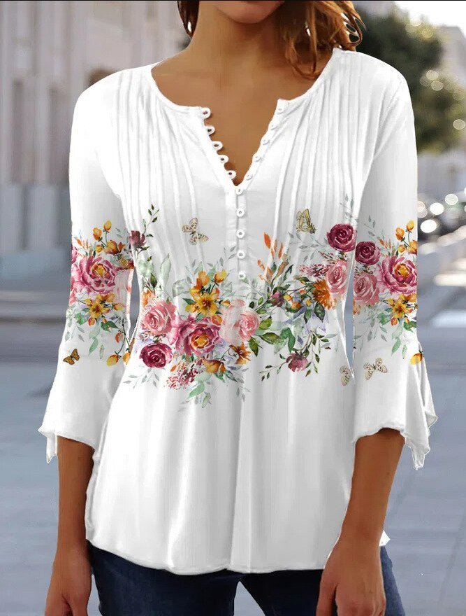 Elegant women's Henley top featuring delicate lace sleeves. Perfect for casual elegant spring outfits.