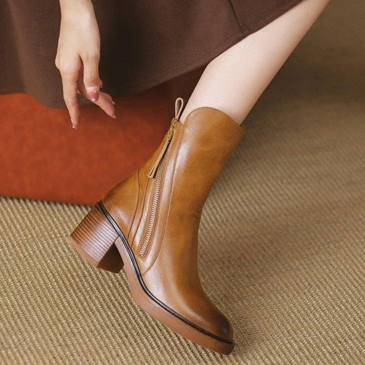 Side view of women's dressy high heel ankle boots with a shock-absorbing sole, perfect for fall.
