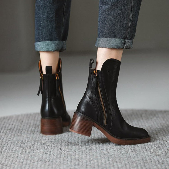 Fashionable women's fall winter high heel ankle boots, featuring an elegant metal zipper & durable sole.