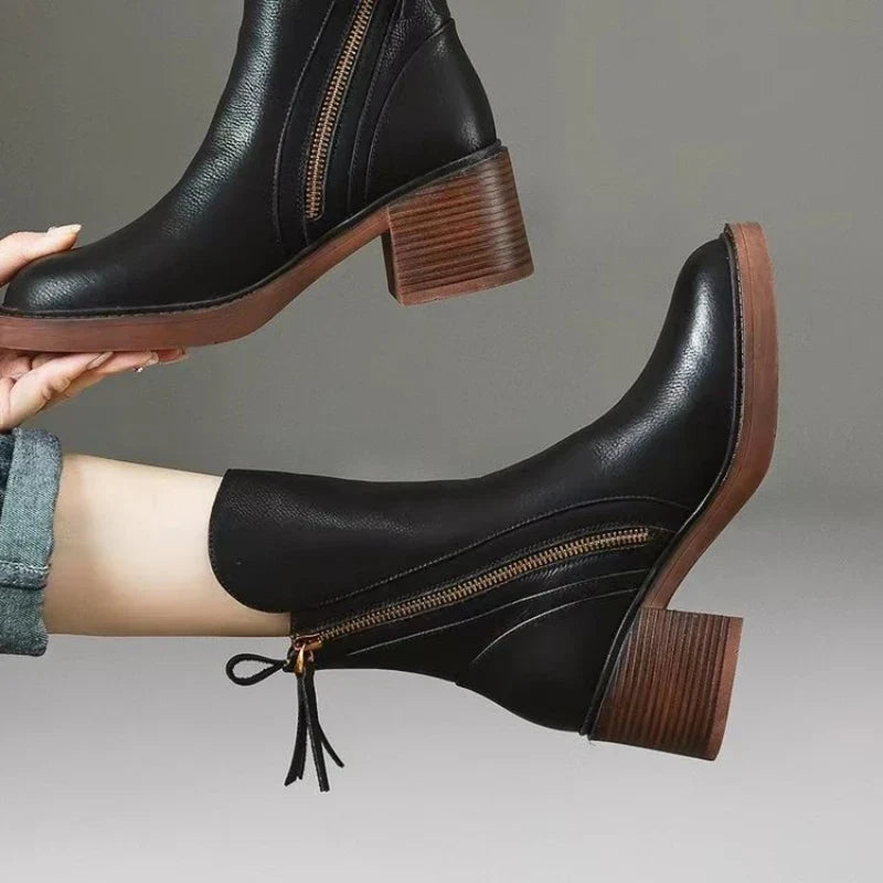 Women's elegant high heel ankle boots, perfect for formal outfits, designed with a shock absorbing comfort heel.