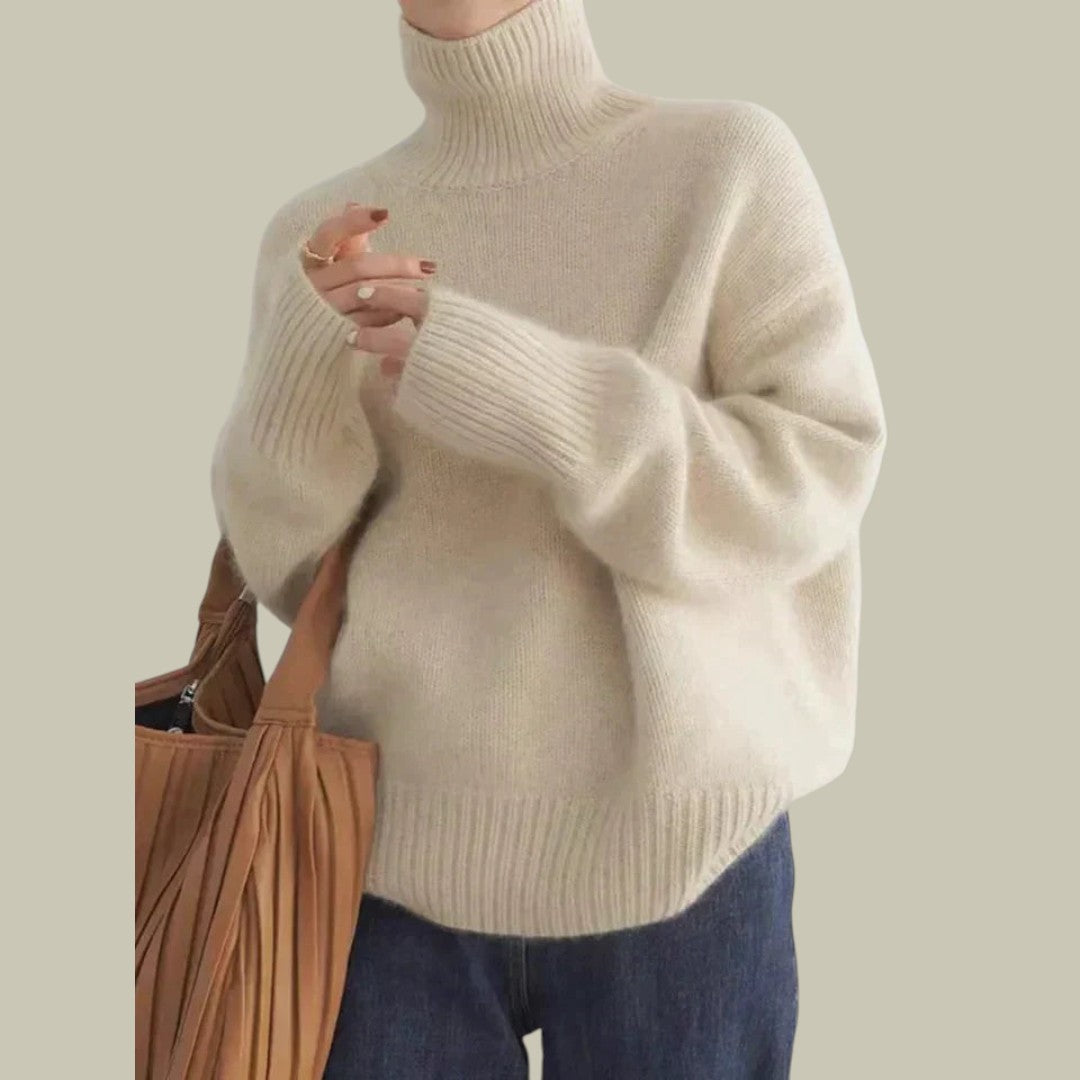 Elegant women's high neck relaxed merino wool sweater, perfect for winter fashion and comfortwear.
