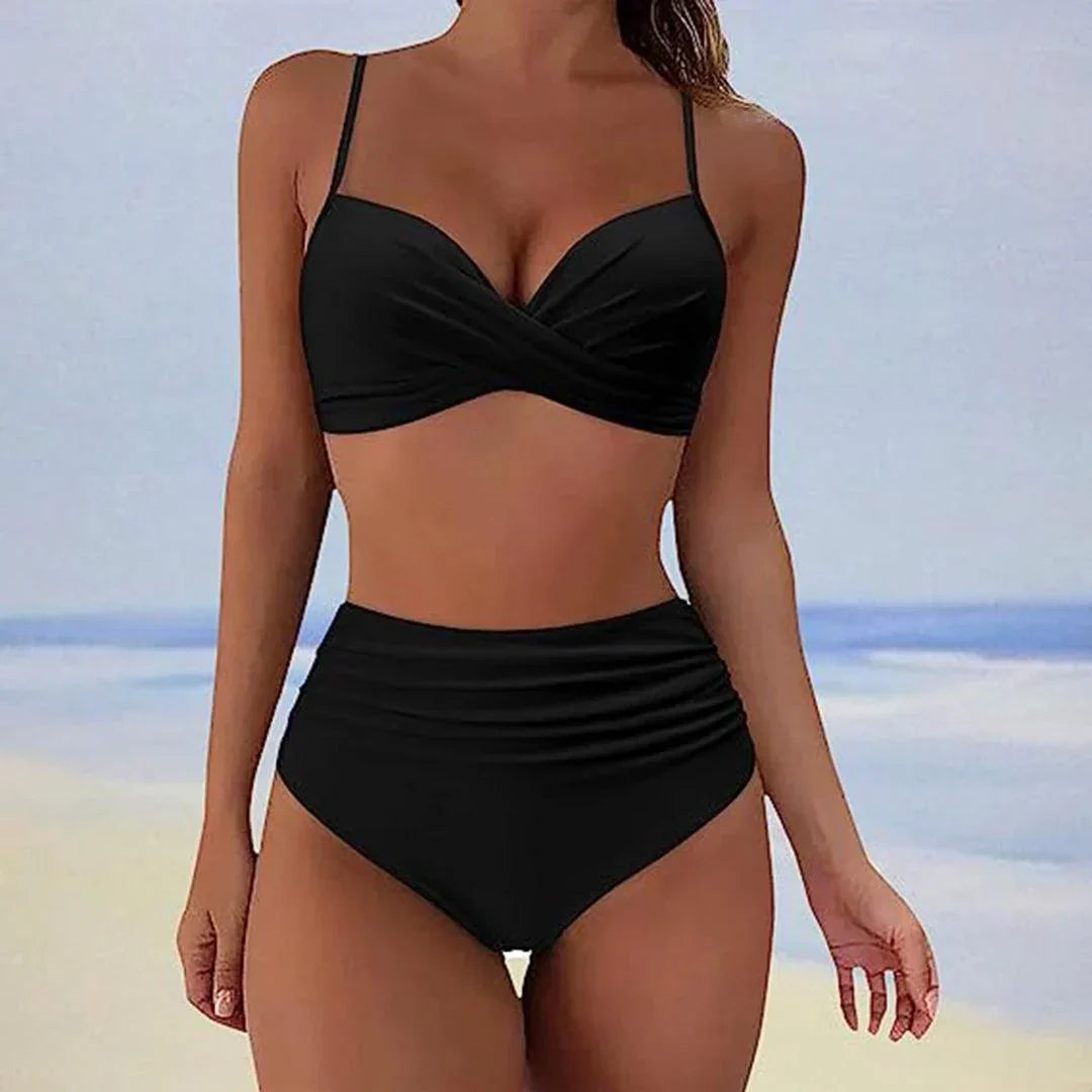Stylish women's high-rise bikini with adjustable straps, ideal for resort wear and beach days.