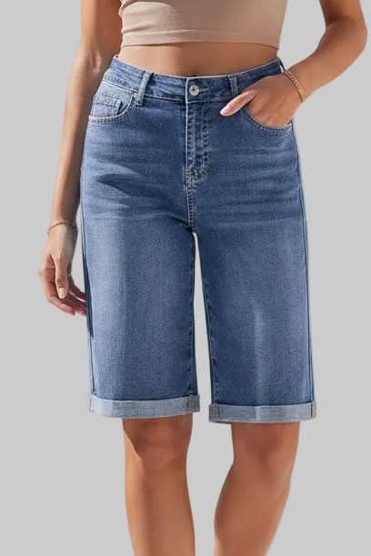 Chic high-rise long shorts for women, offering a flattering and relaxed fit for modern summer fashion.