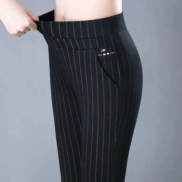 Stylish women's high-waist stripe trousers with practical side pockets. Versatile stretch pants for office & daily wear.
