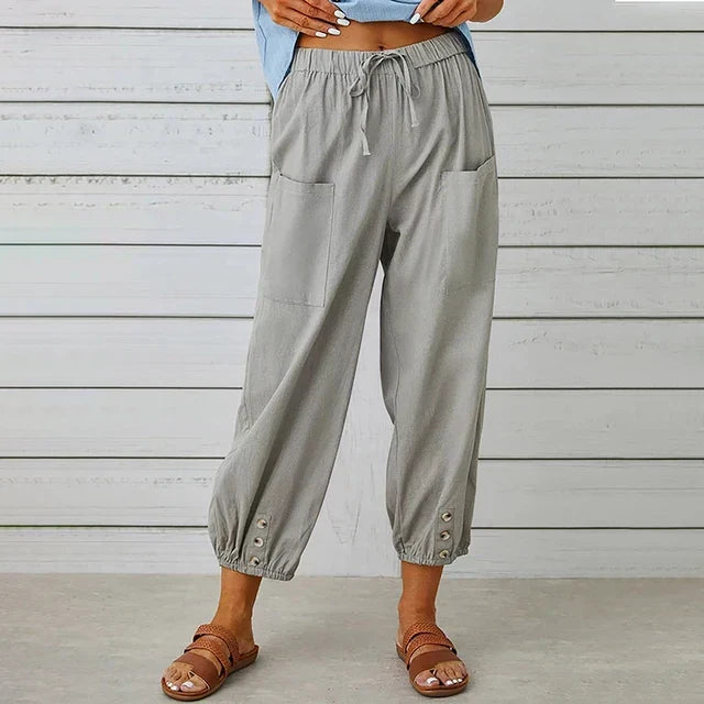 Women's casual high waist pants with an elastic drawstring waist and chic tapered leg.