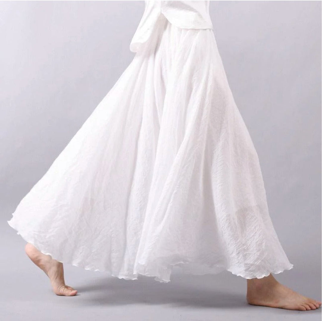 Long bohemian high waist A-line skirt, flowing for beach, vacation, or elegant casual summer outfits.