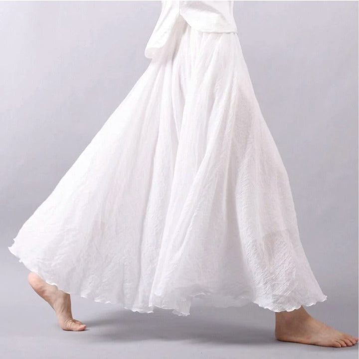 Long bohemian high waist A-line skirt, flowing for beach, vacation, or elegant casual summer outfits.