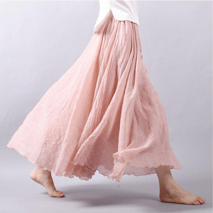 Flowing A-line maxi skirt for women, high waist bohemian style, comfortable for summer fashion & beachwear.