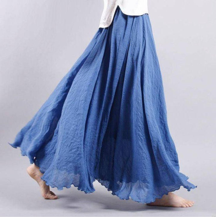 Women's bohemian high waist flowing A-line maxi skirt, comfortable & stylish for beach, vacation, summer.