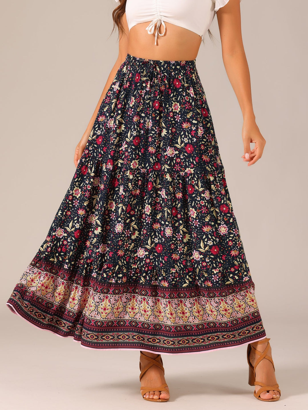Women's high-waist maxi skirt, beautifully printed, flowing silhouette, side slit detail.