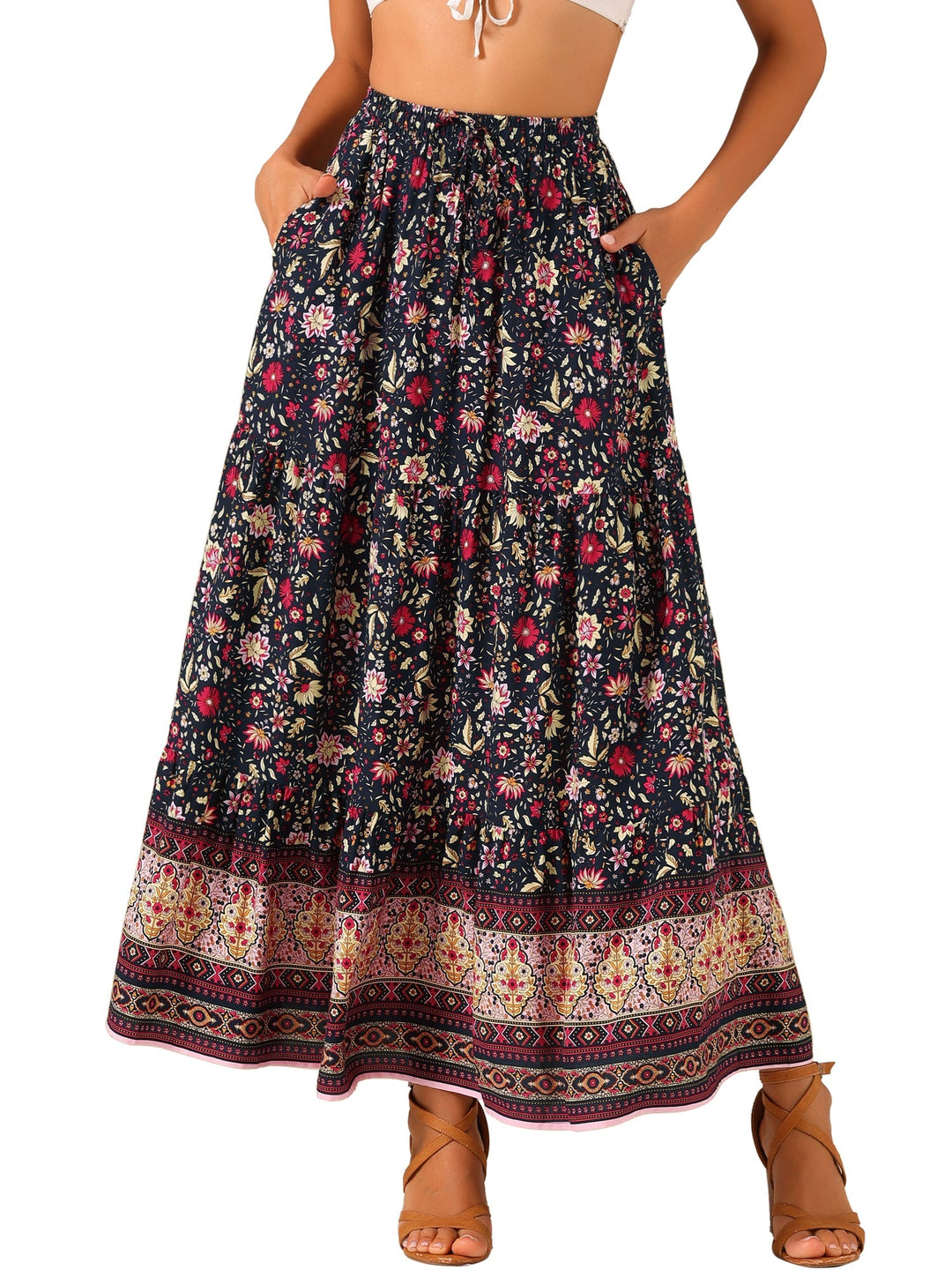 High-waisted women's printed maxi skirt, flowing gracefully, with an appealing side slit.