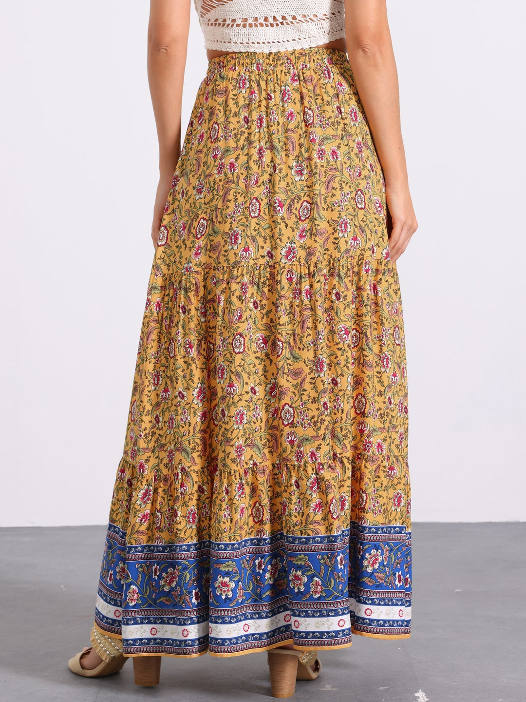 Flowy printed women's maxi skirt, high-waisted, perfect for beach or casual outings.
