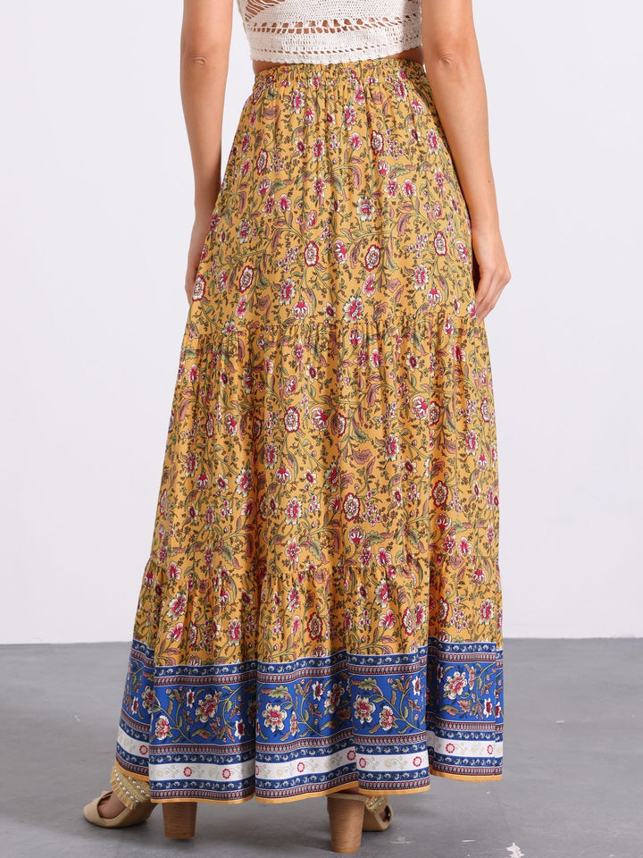Flowy printed women's maxi skirt, high-waisted, perfect for beach or casual outings.