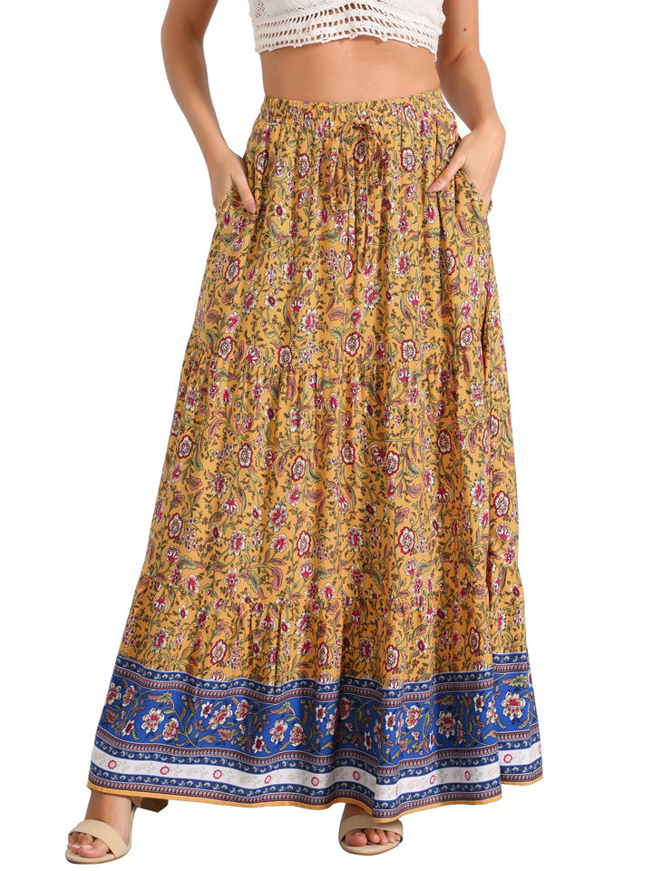 Chic women's high-waist printed maxi skirt, flowing design, with a flattering side slit.