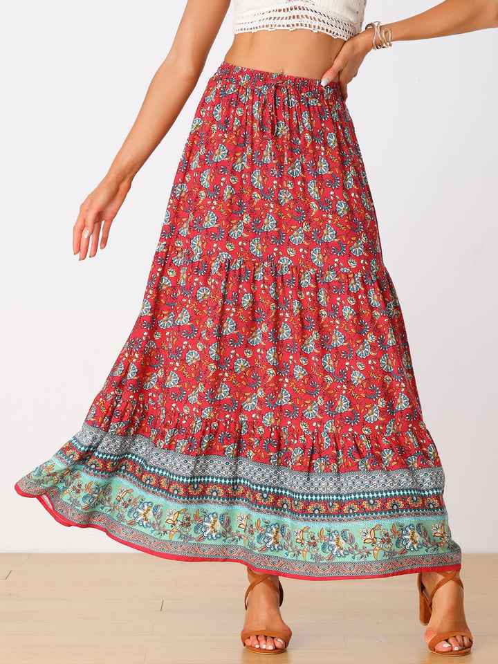 Women's flowing high-waist maxi skirt, eye-catching print, with an elegant side slit.