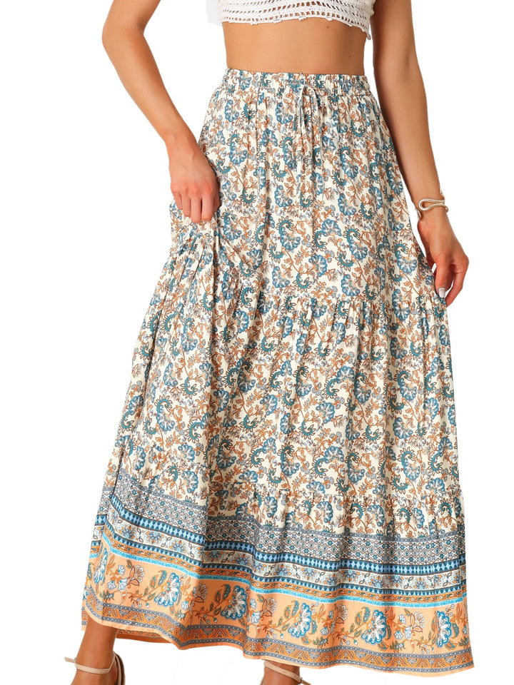 Elegant women's printed maxi skirt, high-waist, flowing, with a stylish side slit.
