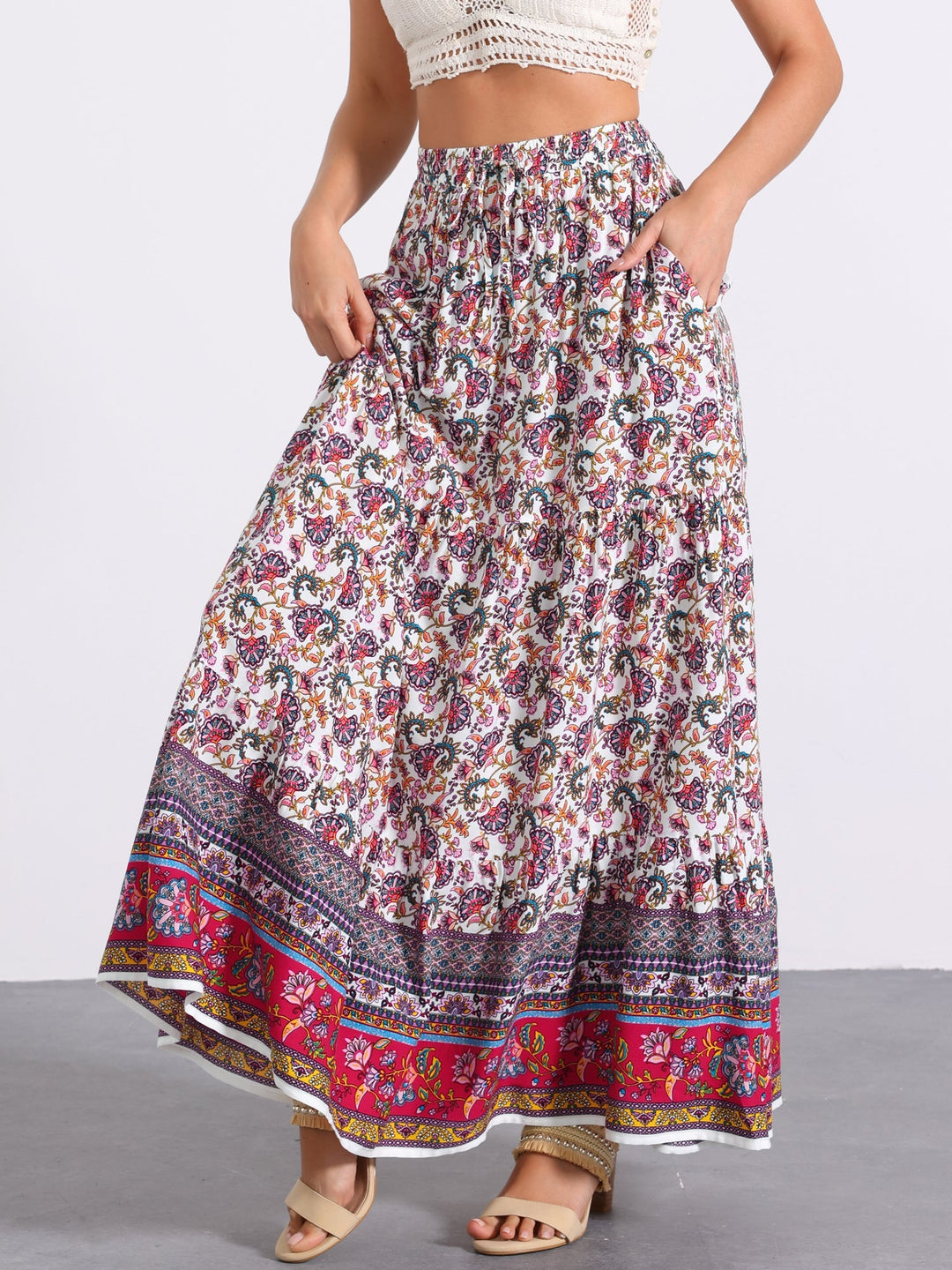High-waisted women's flowing printed maxi skirt, perfect for a breezy summer day.