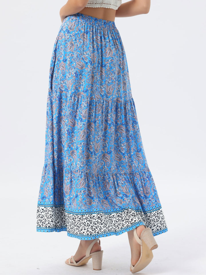 Summer adventure: Women's high-waist flowing printed maxi skirt, side slit design.