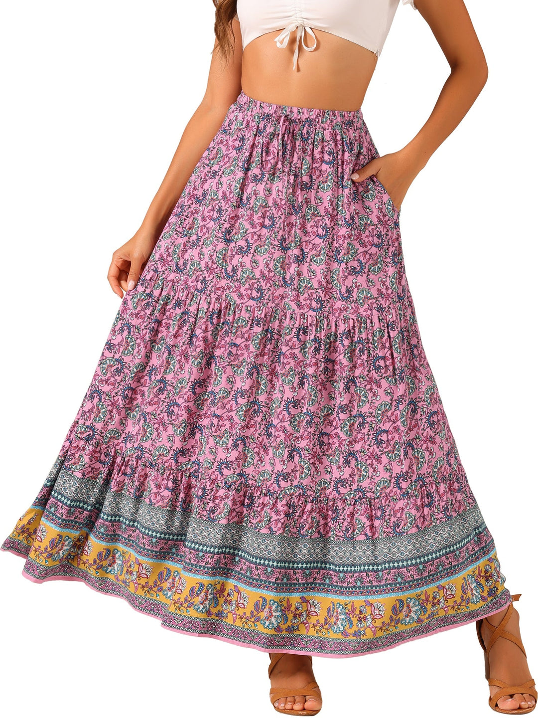 Lightweight high-waist women's maxi skirt, flowing and printed, with a subtle side slit.
