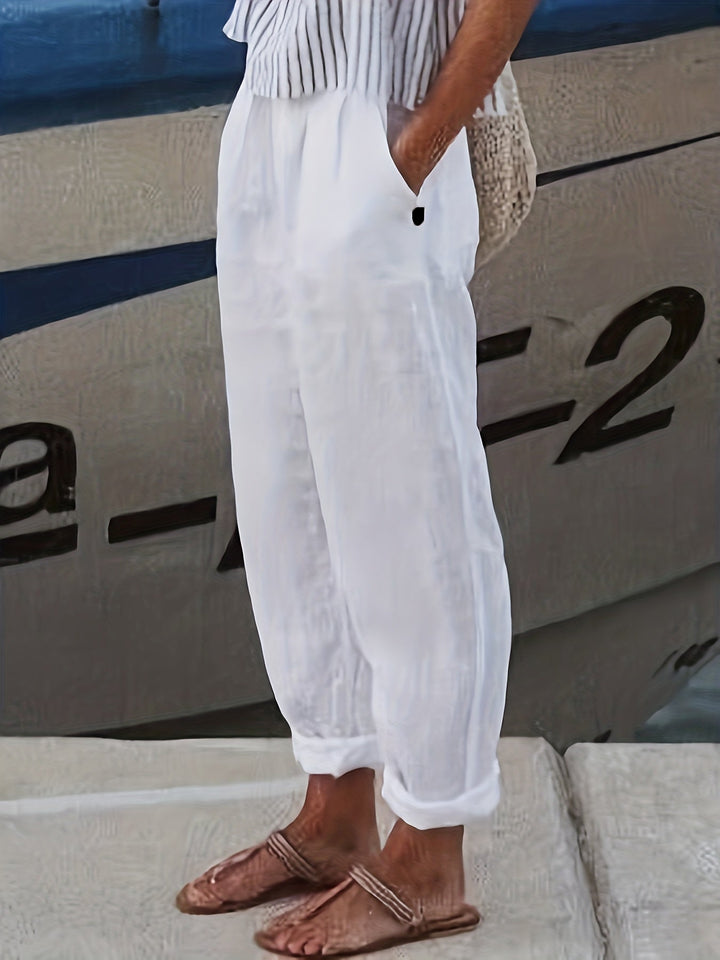 Women's high waist relaxed fit pants with stylish roll hem. Perfect for summer casual wear.