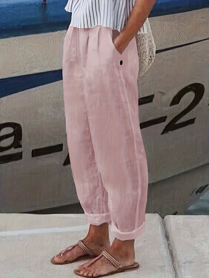 Summer-ready women's high waist relaxed fit pants with a breathable fabric & roll hem.