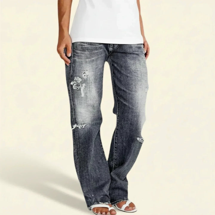 Relaxed fit women's high waist ripped straight leg jeans in blue, ideal for comfortable and stylish everyday wear.