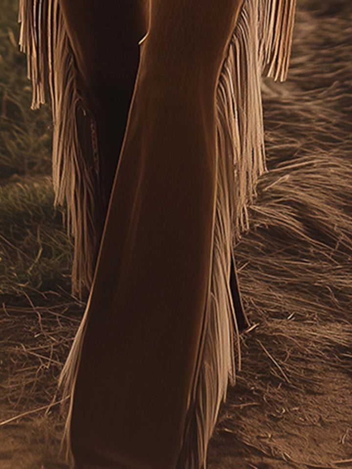Statement women's high waist flare jeans with eye-catching side fringe, ideal for festivals & western events.