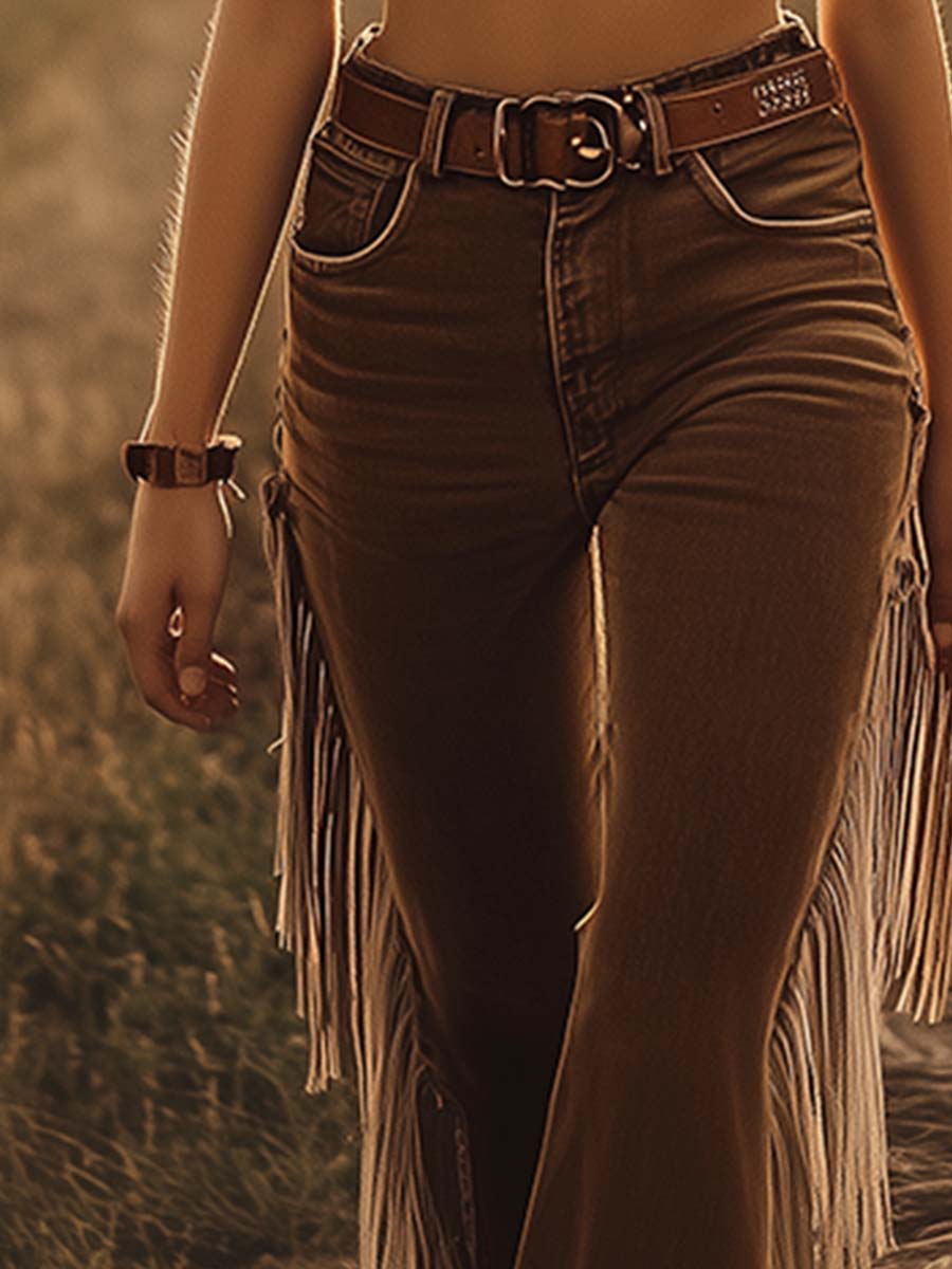 Stylish women's high waist denim flare jeans, featuring trendy side fringe for a perfect western-inspired look.