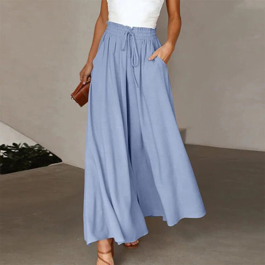 Practical high waist wide leg pants for women, featuring a comfortable drawstring waist and functional pockets.