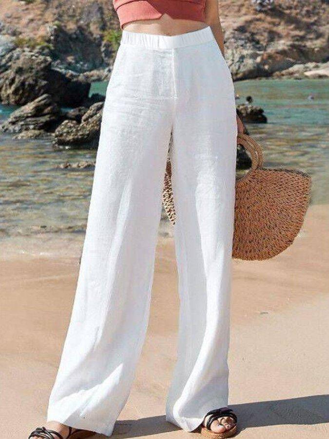 Women's high waist wide leg relaxed fit pants. Comfortable and chic for summer casual wear or vacation.