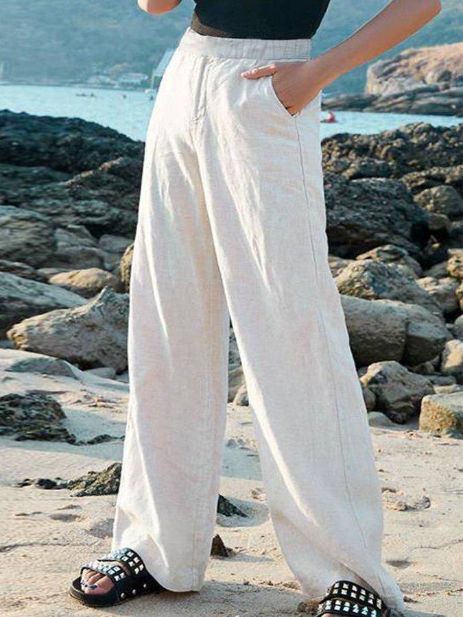 Flowy wide leg high waist trousers for women, perfect for beachwear, summer vacations, or daily casual comfort.