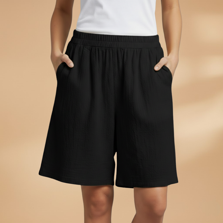 Versatile women's drawstring shorts, high waist & wide leg, great for travel & leisure.