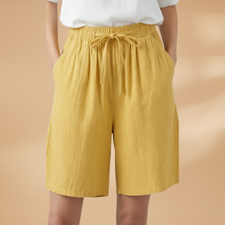 Casual women's wide leg shorts, high waist with elastic drawstring, ideal for summer vacation.